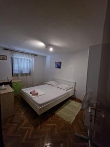 Postel nebo postele na pokoji v ubytování Eros Rooms