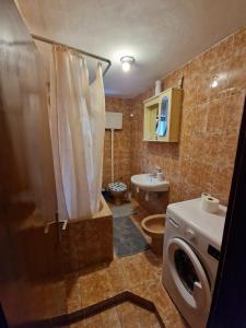 Koupelna v ubytování Eros Rooms