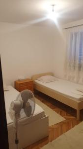 Postel nebo postele na pokoji v ubytování Eros Rooms
