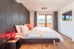 a bedroom with a large bed and a window at stuub todtnauberg in Todtnauberg