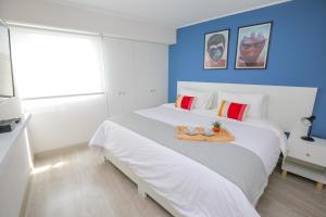 Llit o llits en una habitació de Trendy Host Stelar Miraflores