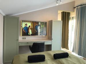 Ένα ή περισσότερα κρεβάτια σε δωμάτιο στο Borbara Apartman