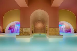 a view of a room with water fountains at GH Palazzo Suite & SPA in Livorno