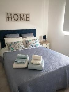 Cama o camas de una habitación en Apartment Oásis Comfort