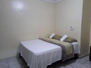 Katil atau katil-katil dalam bilik di Single Room in Corales del Sur - Parque del Este