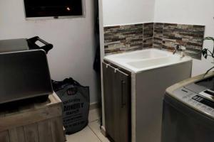 Η κουζίνα ή μικρή κουζίνα στο Apartamento amoblado a 10 min del Parque del Café +19 φωτογραφίες