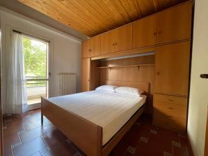 En eller flere senge i et værelse på La Grande Casa Di Montagna