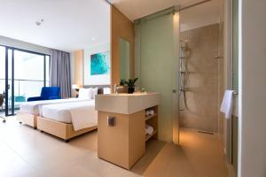 Postel nebo postele na pokoji v ubytování The Empyrean Cam Ranh Beach Resort