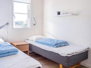 Postel nebo postele na pokoji v ubytování Holiday home Vestervig XXXV