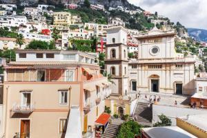 a view of positano from the roofs of buildings at Villa Flavio Gioia in Positano