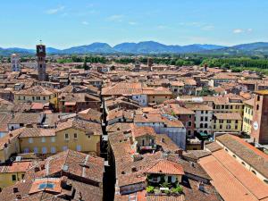 an aerial view of a city with roofs at Apartment in Lucca near Piazza Napoleone in Lucca