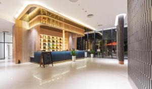 Posezení v ubytování The Empyrean Cam Ranh Beach Resort