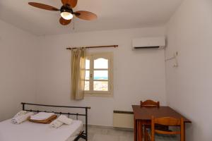 Posteľ alebo postele v izbe v ubytovaní Naxos town sea view apartment free parking