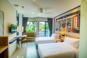 Uma área de estar em Holiday Style Ao Nang Beach Resort, Krabi