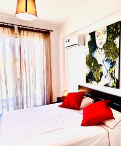 Postel nebo postele na pokoji v ubytování BALI SUITES 101