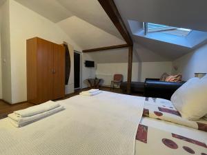 Postel nebo postele na pokoji v ubytování Guest house Elit
