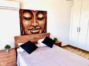 Postel nebo postele na pokoji v ubytování BALI SUITES 404