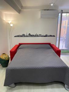 Posteľ alebo postele v izbe v ubytovaní APT a due passi da San Pietro