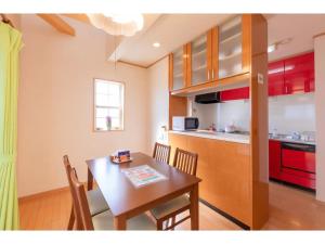 A kitchen or kitchenette at Yado wa Good Rich Aizumi - Vacation STAY 30409v