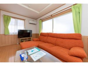 A seating area at Yado wa Good Rich Aizumi - Vacation STAY 30409v
