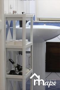 A bed or beds in a room at La casetta mape
