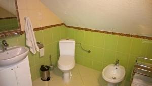 Kúpeľňa v ubytovaní Domek Marców