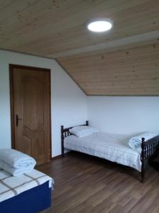 Katil atau katil-katil dalam bilik di Apartman Teodora Uvac