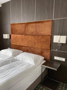 Postel nebo postele na pokoji v ubytování Park Hotel