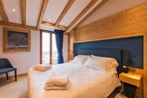 Кровать или кровати в номере La Stua