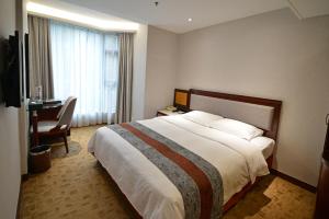 Voodi või voodid majutusasutuse Hotel Guia toas
