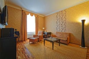 TV a/nebo společenská místnost v ubytování SKARITZ Hotel & Residence