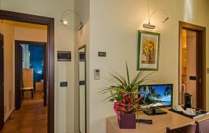 TV a/nebo společenská místnost v ubytování Hotel Gabrini