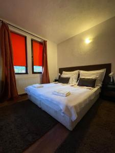 Postel nebo postele na pokoji v ubytování Guest house Elit