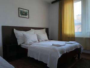 Postel nebo postele na pokoji v ubytování Guest house Elit