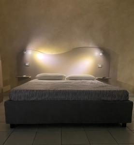 Posteľ alebo postele v izbe v ubytovaní Akoya Rooms Capo Vaticano + 37 fotografií