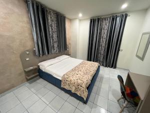 Posteľ alebo postele v izbe v ubytovaní Akoya Rooms Capo Vaticano
