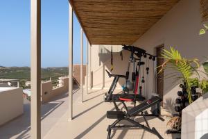 The fitness centre and/or fitness facilities at Anema Villa, a picture-perfect summer escape,By ThinkVilla