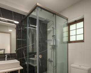 A bathroom at Anema Villa, a picture-perfect summer escape,By ThinkVilla