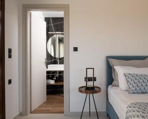 A bed or beds in a room at Anema Villa, a picture-perfect summer escape,By ThinkVilla