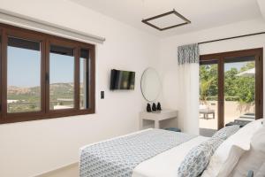 A bed or beds in a room at Anema Villa, a picture-perfect summer escape,By ThinkVilla
