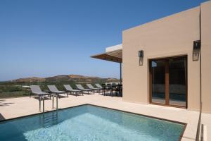 The swimming pool at or close to Anema Villa, a picture-perfect summer escape,By ThinkVilla