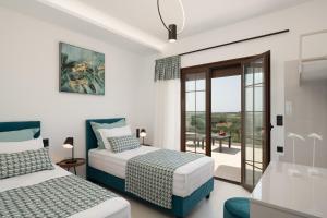A bed or beds in a room at Anema Villa, a picture-perfect summer escape,By ThinkVilla