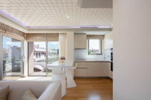 Kuchyň nebo kuchyňský kout v ubytování Ni President Suite, DeMaNi President Suites