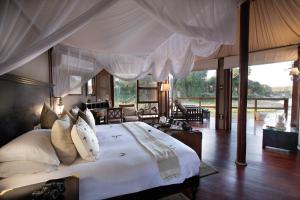 Postel nebo postele na pokoji v ubytování Hamiltons Tented Camp + 37 fotografií