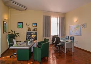 TV a/nebo společenská místnost v ubytování Hotel Gabrini