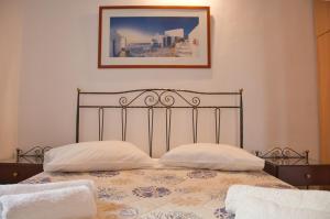 Ένα ή περισσότερα κρεβάτια σε δωμάτιο στο Hotel Andreas - Agistri (Skala)