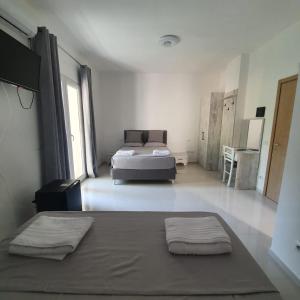 Postel nebo postele na pokoji v ubytování Hotel 33