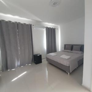 Postel nebo postele na pokoji v ubytování Hotel 33