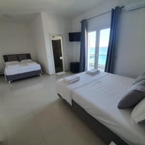 Postel nebo postele na pokoji v ubytování Hotel 33