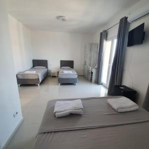 Postel nebo postele na pokoji v ubytování Hotel 33